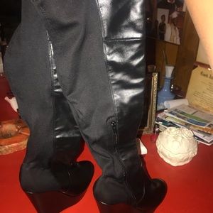 To the knee wedge boots